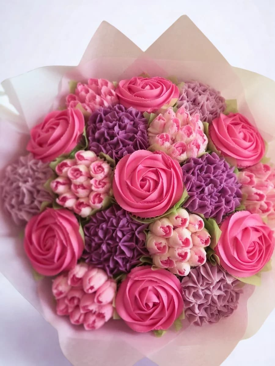 Cupcake Bouquets with buttercream roses in pink and purple
